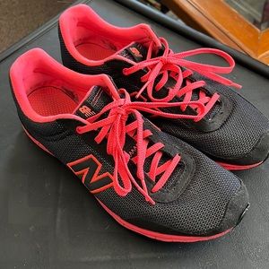 New balance woman’s black and pink sneakers. Size 8